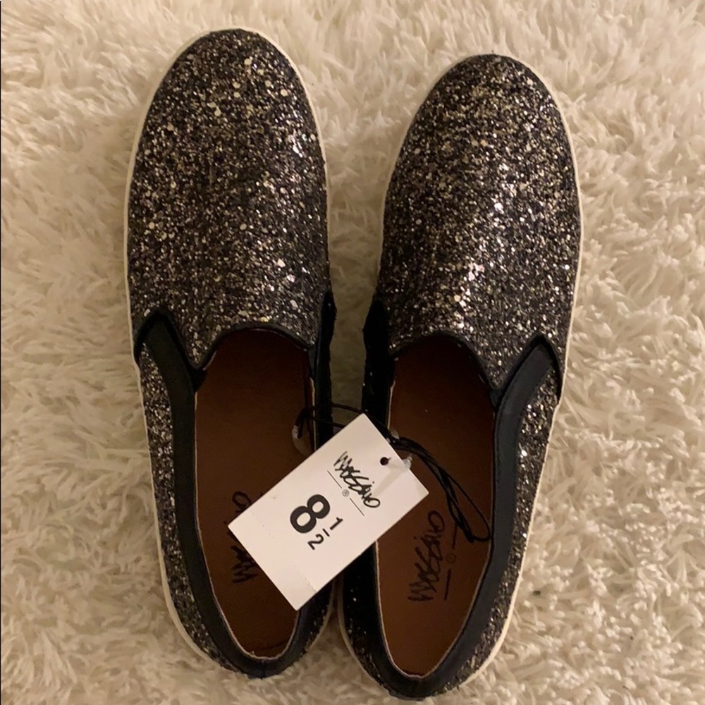 Black and silver loafers